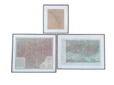 An 1888 clothbound framed folding map of the Tyrol; and another two framed maps of parts of