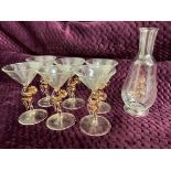 A deco Bimini glass cocktail set with six glasses having conical bowls raised on dancing girl stems,