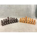 A Chinese carved soapstone chess set with emperor and empress, kings & queens, elephant bishops,