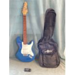 A cased Gear4Music electric guitar with horned blue lacquered body, perspex pick guard, nickel