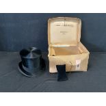 An Edwardian boxed silk top hat by GA Dunn & Co. Ltd., with velvet smoothing pad, formerly the