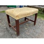 A Georgian mahogany Chippendale style stool with damask upholstered serpentine sided seat raised