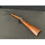 A replica 1859 Sharps percussion cap military carbine by Denix, with blacked trigger, lock and