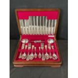 A mahogany Walker & Hall canteen of kings pattern silver plate with six settings.