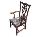 A C19th mahogany Chippendale style childs armchair with shaped back and pierced splat above a drop-