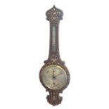 A Victorian rosewood wheel barometer by R Love of Greenock, the scrolled case inlaid allover with