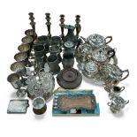 Collection of assorted metalwares to include a set of four candlesticks, three three piece silver pl