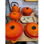 Group of Le Creuset pans and a kettle