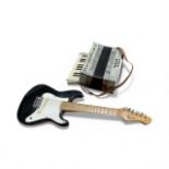 Hohner Rockwood electric guitar and a Majestic accordion