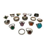 9ct gold gem set dress ring, 9ct white gold gem set eternity ring, collection of silver rings and so