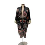 Chinese embroidered silk robe with blue silk lining, roundels with figures
