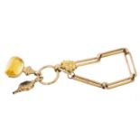 Victorian gilt metal large fetter link watch chain suspending a Victorian revolving fob and a watch