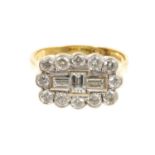 Diamond cluster ring with three baguette cut diamonds surrounded by a border of 12 brilliant cut dia