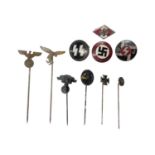 Group of Nazi German stick pins and pin badges.