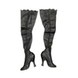 19th Century black leather thigh-high button boots, with high waisted heel. Leather sole and leather