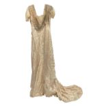 1911 Evening gown by Reville & Rossiter, Hanover Square, London. Cream satin silk in scrolling shamr