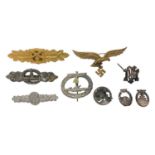 Group of nine Nazi German clasp badges.