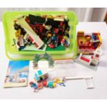 A crate containing a quantity of Lego components for a Pizzeria building, assorted Playmobil