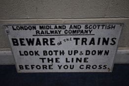 A WHITE AND BLACK PAINTED CAST ALUMINIUM RAILWAY SIGN, warning people to look both ways before