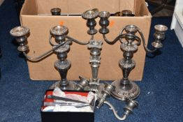 A BOX OF SILVER PLATED AND WHITE METAL CANDLESTICKS, to include a pair of three branch candlesticks,