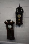 AN EARLY 20TH CENTURY MAHOGANY VIENNA WALL CLOCK, the arched glass door enclosing an 8 inch
