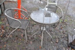 A GLASS TOPPED GARDEN TABLE AND TWO MATCHING CHAIRS table diameter 60cm (3)