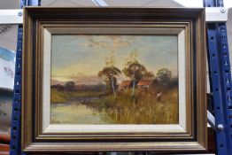 WALTER LEWIS (19TH/20TH CENTURY) SUNSET LANDSCAPE, a female figure carrying provisions on her head