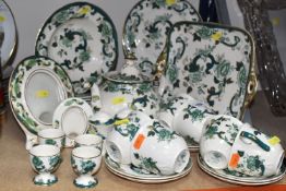 A GROUP OF MASON'S 'CHARTREUSE' CERAMICS to include a teapot (chipped interior), six cups (one