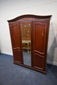 A MODERN MAHOGANY TRIPLE DOOR WARDROBE, with a central mirror door, width 149cm x depth 63cm x