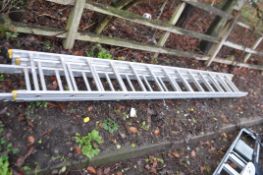 AN ALUMINIUM TRIPLE EXTENSION LADDER with 13 rungs to each 340cm length