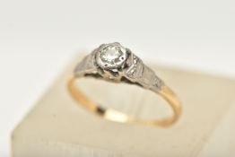 A YELLOW AND WHITE METAL SINGLE STONE DIAMOND RING, illusion white metal setting, set with a
