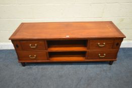 A MODERN HARDWOOD TV UNIT, fitted with four assorted drawers, width 153cm x depth 52cm x height