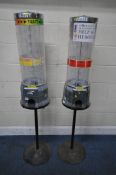 TWO SWEET TOWER DISPENSING MACHINES, on a stand, height 157cm, Condition Report: NO KEYS AND LOCKED,