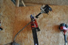 A RYOBI PETROL STRIMMER and a Champion petrol chainsaw (both engine pull freely but haven't been