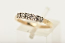 A 9CT YELLOW AND WHITE GOLD DIAMOND FIVE STONE RING, set with round brilliant cut diamonds,