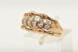 A 9CT GOLD DIAMOND RING, designed as five sections each set with two small round brilliant cut