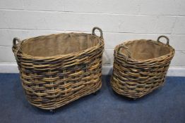 TWO WICKER OVAL GRADUATED RECTANGULAR WHEELED BASKETS, largest measurement 89cm x depth 64cm x