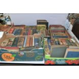 FOUR BOXES OF BOOKS containing sixty five historical adventure titles from authors including G.A