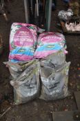 FOUR KELKAY BAGS CONTAINING BLACK SLATE 40MM CHIPPINGS along with 4 bags of Ericaceous compost (