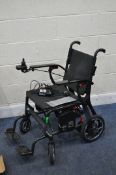 A CARE CO iCONNECT ZORA CARBON FIBRE ELECTRIC WHEELCHAIR with original box, charger, seat pad and