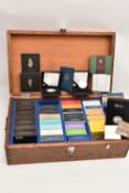 A LARGE AND HEAVY WOODEN TRUNK CONTAINING 33 x ROYAL MINT BOXED PROOF COINS, to include: 34 x Silver