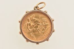 A MOUNTED HALF SOVEREIGN PENDANT, Edward VII 1911, George and the Dragon, mounted in yellow metal,