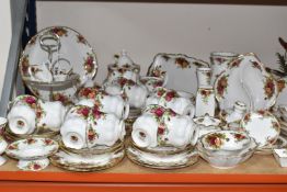 SIXTY SEVEN PIECES OF ROYAL ALBERT 'OLD COUNTRY ROSES' TEA AND GIFTWARE comprising a two tier cake
