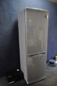 A LG GR-399SNQ TALL FRIDGE FREEZER width 60cm, depth 60cm, height 188cm and a Cookworks microwave (