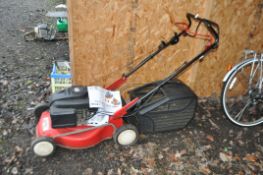 AN EMAK K600 SERIE LR SELF PROPELLED PETROL LAWN MOWER with grassbox (engine pulls freely but hasn't