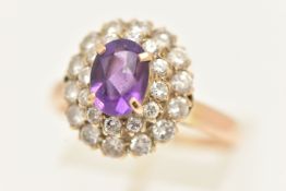 A 9CT GOLD AMETHYST AND DIAMOND CLUSTER RING, estimated total diamond weight 0.90ct, hallmarked