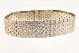 A 9CT WHITE GOLD ARTICULATED BRACELET, wide textured bracelet, fitted with a slide and lock clasp,