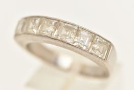 A WHITE METAL DIAMOND HALF ETERNITY RING, set with a row of six princess cut diamonds, estimated