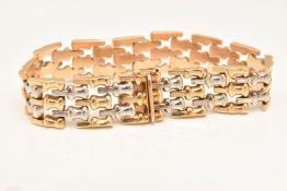 A GOLD BI-COLOUR ARTICULATED WIDE BRACELET, white and yellow metal links, fitted with a push piece