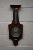 AN ART DECO WALNUT BAROMETER, height 69cm, condition report untested, overall good condition